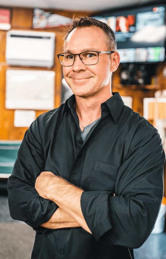 Russell, barber at Walnut Street Barber Shop